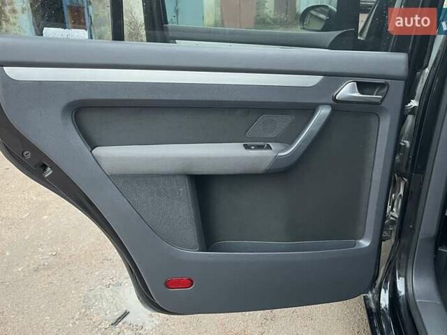 Черный Фольксваген Туран, объемом двигателя 1.4 л и пробегом 194 тыс. км за 6555 $, фото 115 на Automoto.ua