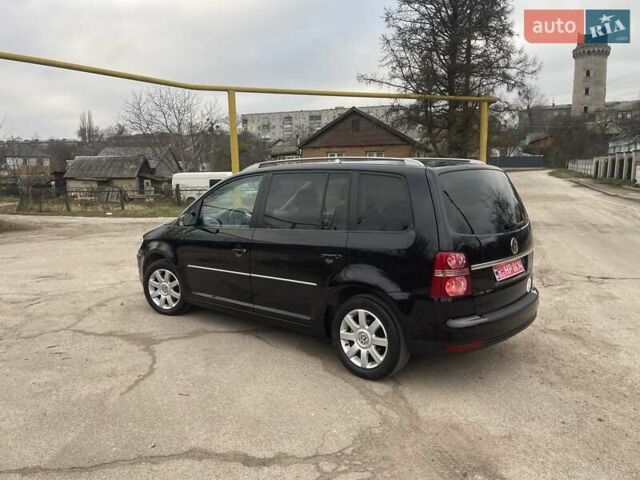 Черный Фольксваген Туран, объемом двигателя 1.4 л и пробегом 194 тыс. км за 6555 $, фото 35 на Automoto.ua