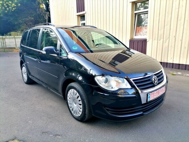 Чорний Фольксваген Туран, об'ємом двигуна 0 л та пробігом 194 тис. км за 6600 $, фото 1 на Automoto.ua