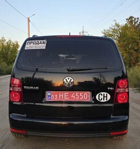 Черный Фольксваген Туран, объемом двигателя 1.4 л и пробегом 194 тыс. км за 7600 $, фото 8 на Automoto.ua
