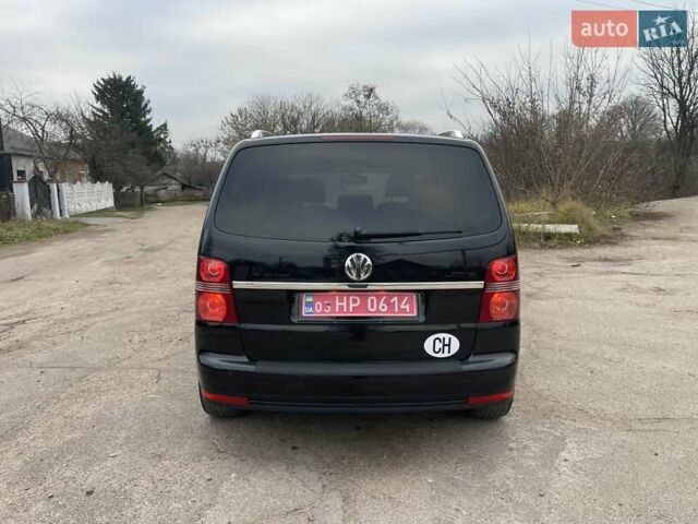 Черный Фольксваген Туран, объемом двигателя 1.4 л и пробегом 194 тыс. км за 6555 $, фото 104 на Automoto.ua