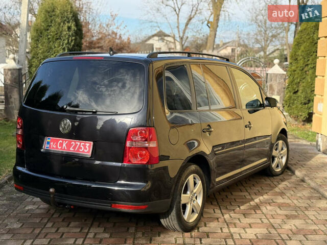 Чорний Фольксваген Туран, об'ємом двигуна 1.4 л та пробігом 148 тис. км за 5999 $, фото 27 на Automoto.ua