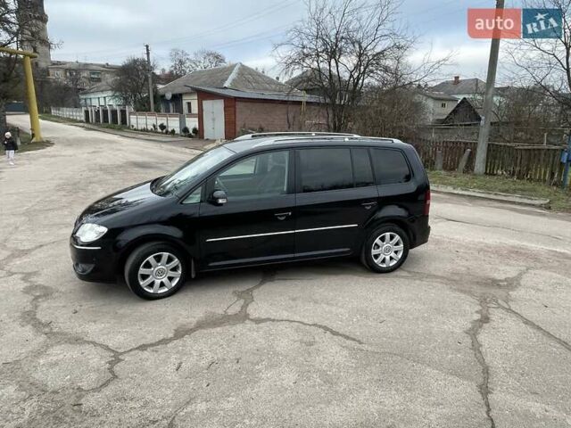 Черный Фольксваген Туран, объемом двигателя 1.4 л и пробегом 194 тыс. км за 6555 $, фото 31 на Automoto.ua