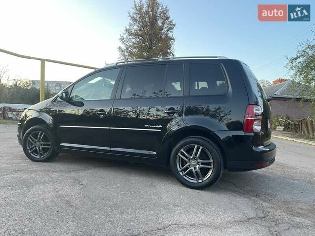 Черный Фольксваген Туран, объемом двигателя 1.4 л и пробегом 238 тыс. км за 7888 $, фото 78 на Automoto.ua