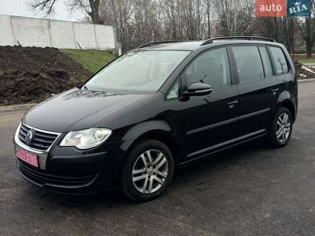 Черный Фольксваген Туран, объемом двигателя 1.6 л и пробегом 249 тыс. км за 7999 $, фото 6 на Automoto.ua