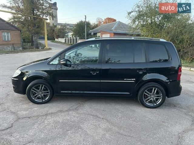 Черный Фольксваген Туран, объемом двигателя 1.4 л и пробегом 238 тыс. км за 7888 $, фото 85 на Automoto.ua