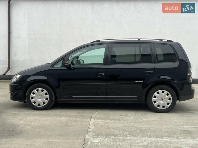 Черный Фольксваген Туран, объемом двигателя 1.4 л и пробегом 213 тыс. км за 8100 $, фото 21 на Automoto.ua