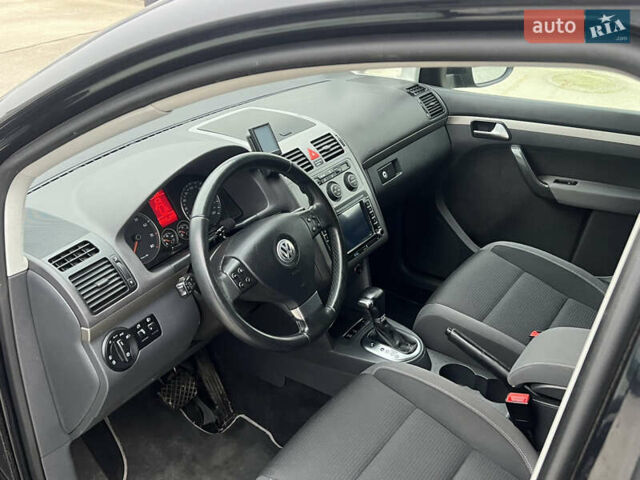 Черный Фольксваген Туран, объемом двигателя 1.4 л и пробегом 213 тыс. км за 8100 $, фото 46 на Automoto.ua