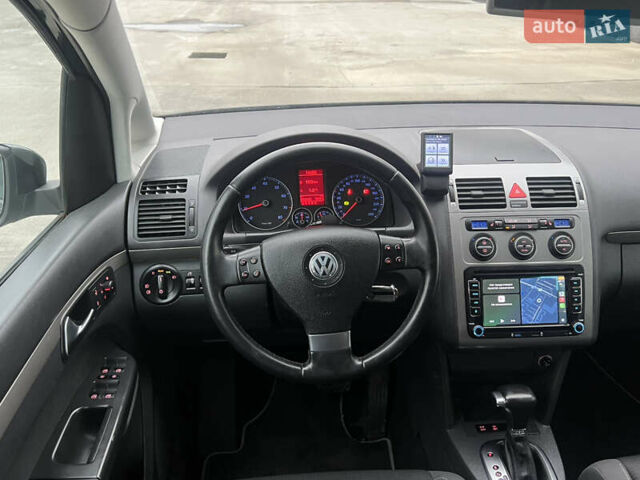 Черный Фольксваген Туран, объемом двигателя 1.4 л и пробегом 213 тыс. км за 8100 $, фото 54 на Automoto.ua