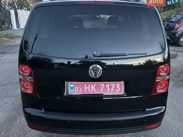 Черный Фольксваген Туран, объемом двигателя 1.4 л и пробегом 238 тыс. км за 7888 $, фото 8 на Automoto.ua