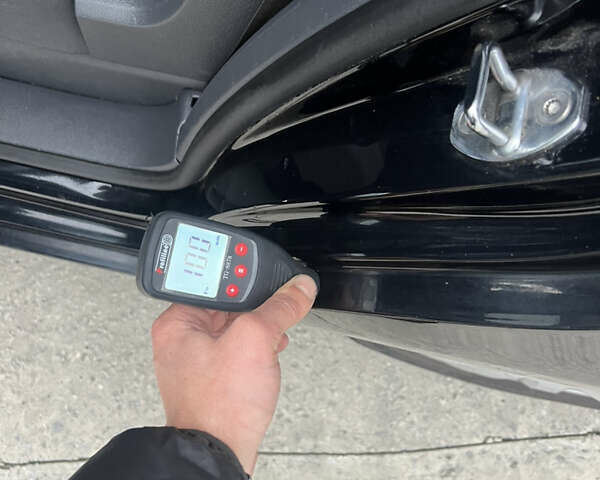 Черный Фольксваген Туран, объемом двигателя 1.4 л и пробегом 213 тыс. км за 8100 $, фото 77 на Automoto.ua