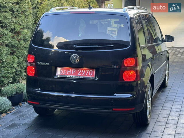 Черный Фольксваген Туран, объемом двигателя 1.4 л и пробегом 199 тыс. км за 7999 $, фото 5 на Automoto.ua
