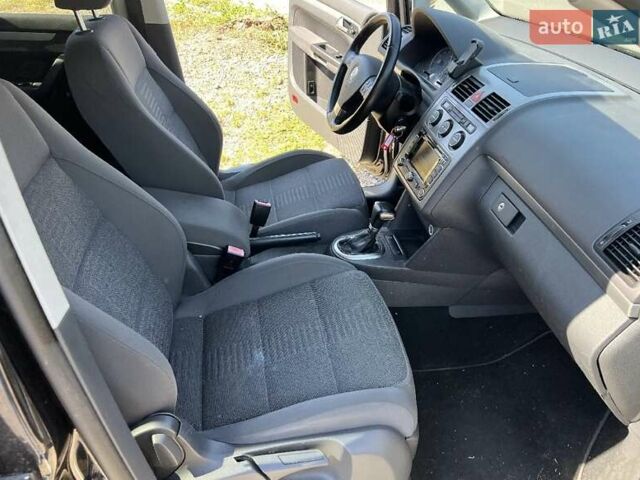 Черный Фольксваген Туран, объемом двигателя 1.4 л и пробегом 238 тыс. км за 7888 $, фото 265 на Automoto.ua