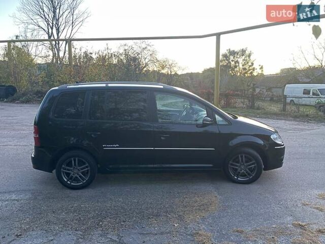 Черный Фольксваген Туран, объемом двигателя 1.4 л и пробегом 238 тыс. км за 7888 $, фото 221 на Automoto.ua