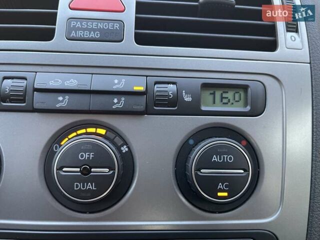 Черный Фольксваген Туран, объемом двигателя 1.4 л и пробегом 238 тыс. км за 7888 $, фото 71 на Automoto.ua