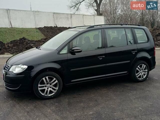 Черный Фольксваген Туран, объемом двигателя 1.6 л и пробегом 249 тыс. км за 7999 $, фото 8 на Automoto.ua