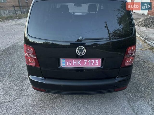 Черный Фольксваген Туран, объемом двигателя 1.4 л и пробегом 238 тыс. км за 7888 $, фото 218 на Automoto.ua