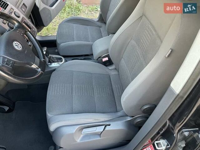 Черный Фольксваген Туран, объемом двигателя 1.4 л и пробегом 238 тыс. км за 7888 $, фото 57 на Automoto.ua