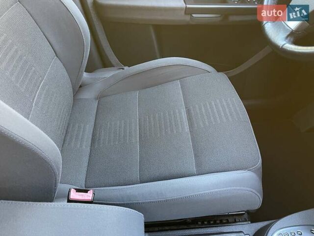 Черный Фольксваген Туран, объемом двигателя 1.4 л и пробегом 238 тыс. км за 7888 $, фото 240 на Automoto.ua