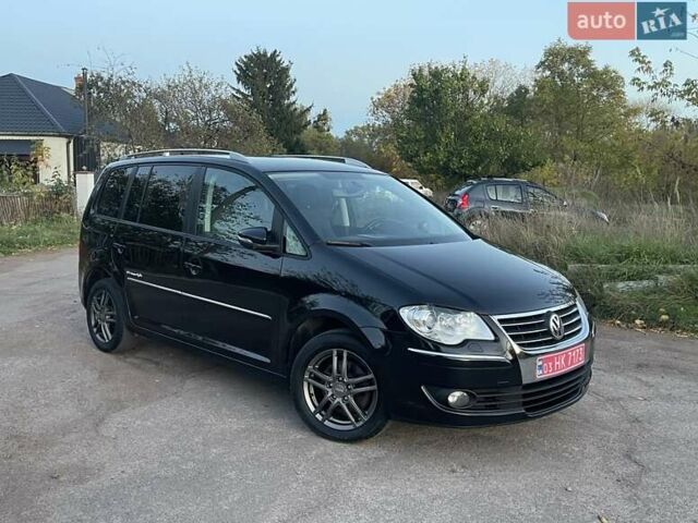 Черный Фольксваген Туран, объемом двигателя 1.4 л и пробегом 238 тыс. км за 7888 $, фото 89 на Automoto.ua