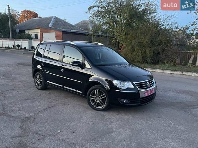 Черный Фольксваген Туран, объемом двигателя 1.4 л и пробегом 238 тыс. км за 7888 $, фото 190 на Automoto.ua