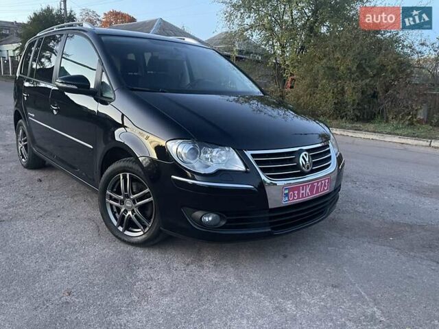 Черный Фольксваген Туран, объемом двигателя 1.4 л и пробегом 238 тыс. км за 7888 $, фото 193 на Automoto.ua