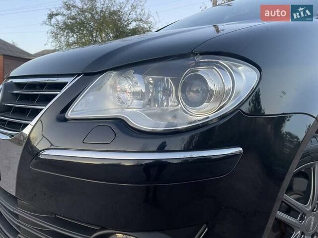 Черный Фольксваген Туран, объемом двигателя 1.4 л и пробегом 238 тыс. км за 7888 $, фото 18 на Automoto.ua