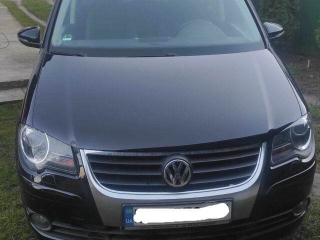 Чорний Фольксваген Туран, об'ємом двигуна 0 л та пробігом 207 тис. км за 7778 $, фото 1 на Automoto.ua