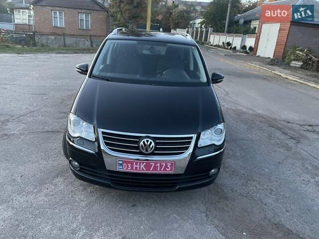 Черный Фольксваген Туран, объемом двигателя 1.4 л и пробегом 238 тыс. км за 7888 $, фото 111 на Automoto.ua