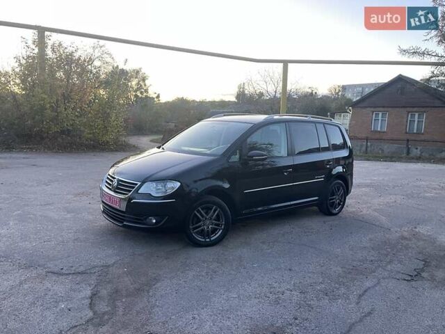 Черный Фольксваген Туран, объемом двигателя 1.4 л и пробегом 238 тыс. км за 7888 $, фото 113 на Automoto.ua