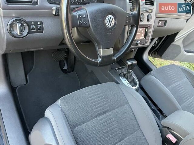 Черный Фольксваген Туран, объемом двигателя 1.4 л и пробегом 238 тыс. км за 7888 $, фото 56 на Automoto.ua
