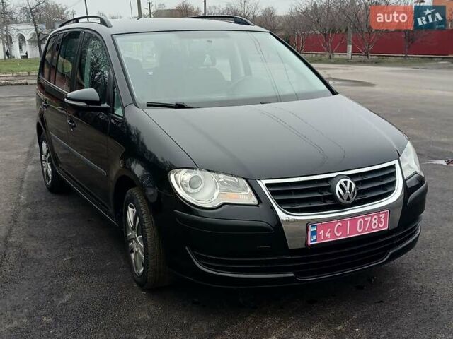 Черный Фольксваген Туран, объемом двигателя 1.6 л и пробегом 249 тыс. км за 7999 $, фото 25 на Automoto.ua