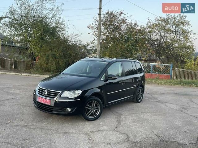 Черный Фольксваген Туран, объемом двигателя 1.4 л и пробегом 238 тыс. км за 7888 $, фото 15 на Automoto.ua