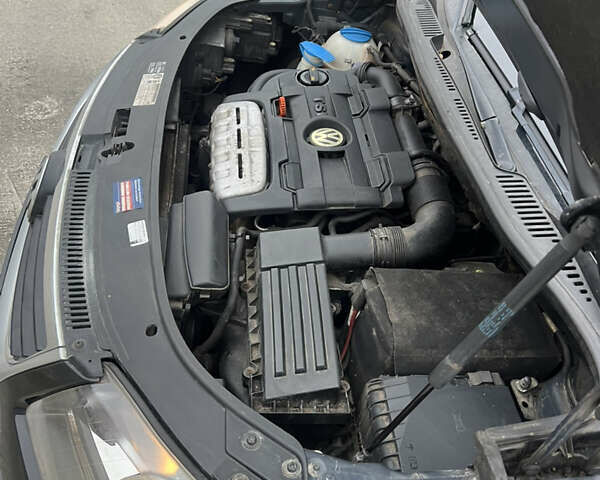 Черный Фольксваген Туран, объемом двигателя 1.4 л и пробегом 213 тыс. км за 8100 $, фото 60 на Automoto.ua