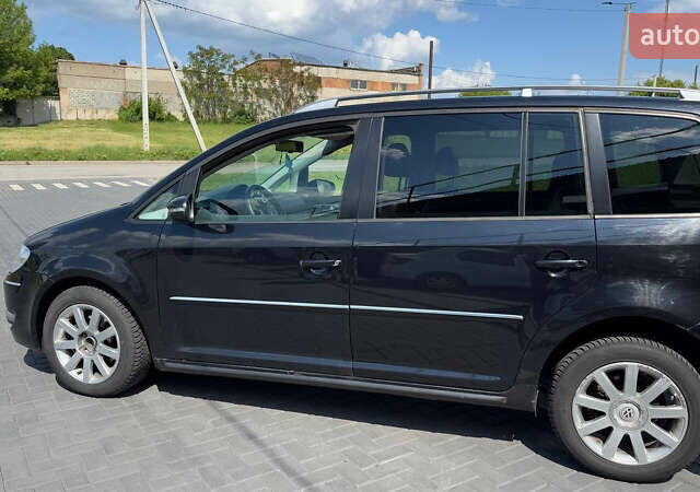 Черный Фольксваген Туран, объемом двигателя 1.97 л и пробегом 285 тыс. км за 7100 $, фото 5 на Automoto.ua