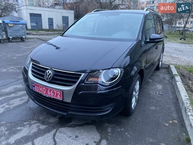 Чорний Фольксваген Туран, об'ємом двигуна 2 л та пробігом 207 тис. км за 8700 $, фото 1 на Automoto.ua