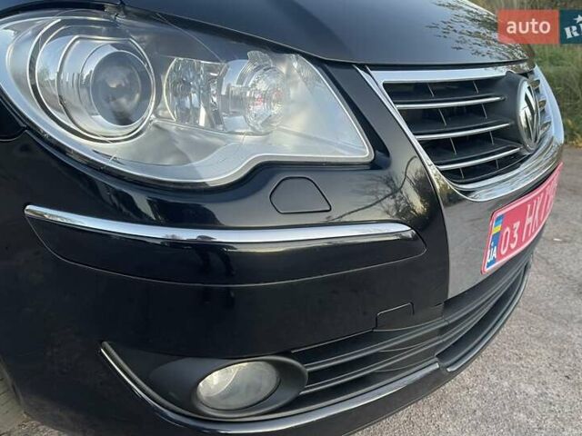 Черный Фольксваген Туран, объемом двигателя 1.4 л и пробегом 238 тыс. км за 7888 $, фото 22 на Automoto.ua