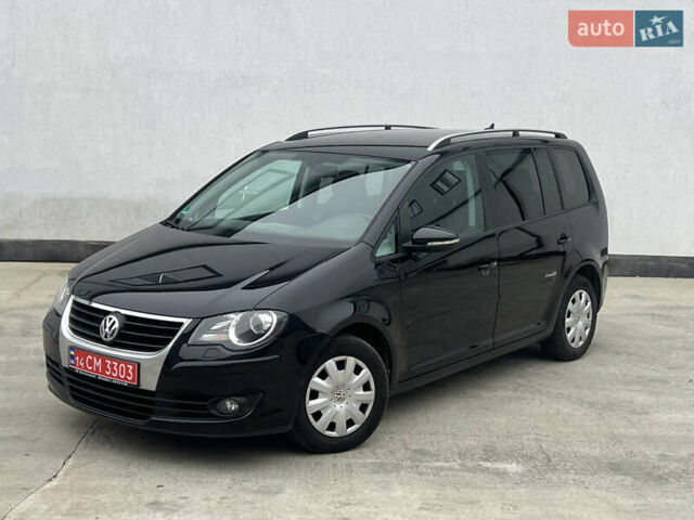 Черный Фольксваген Туран, объемом двигателя 1.4 л и пробегом 213 тыс. км за 8100 $, фото 9 на Automoto.ua