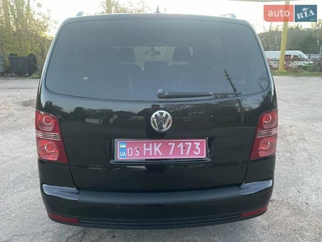 Черный Фольксваген Туран, объемом двигателя 1.4 л и пробегом 238 тыс. км за 7888 $, фото 35 на Automoto.ua