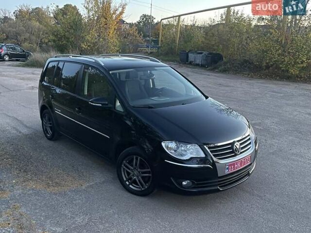 Черный Фольксваген Туран, объемом двигателя 1.4 л и пробегом 238 тыс. км за 7888 $, фото 219 на Automoto.ua