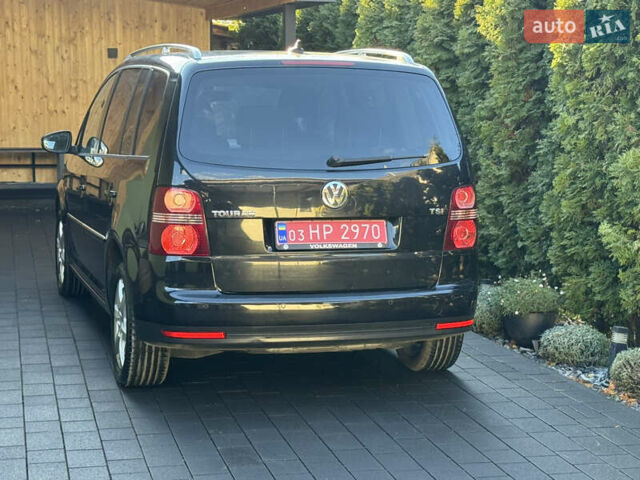 Черный Фольксваген Туран, объемом двигателя 1.4 л и пробегом 199 тыс. км за 7999 $, фото 6 на Automoto.ua