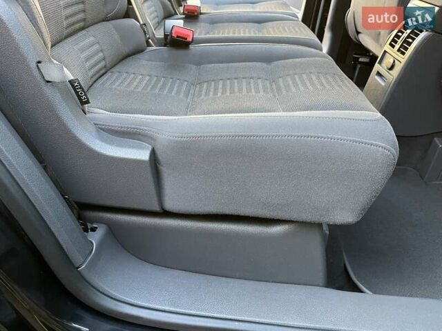 Черный Фольксваген Туран, объемом двигателя 1.4 л и пробегом 238 тыс. км за 7888 $, фото 149 на Automoto.ua