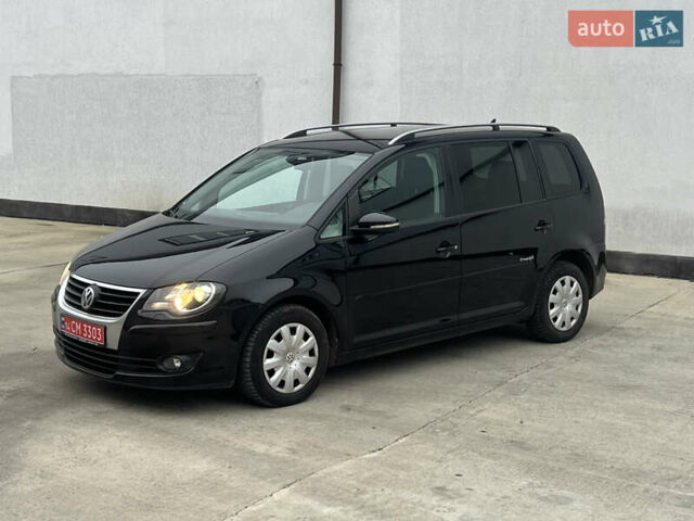 Черный Фольксваген Туран, объемом двигателя 1.4 л и пробегом 213 тыс. км за 8100 $, фото 86 на Automoto.ua