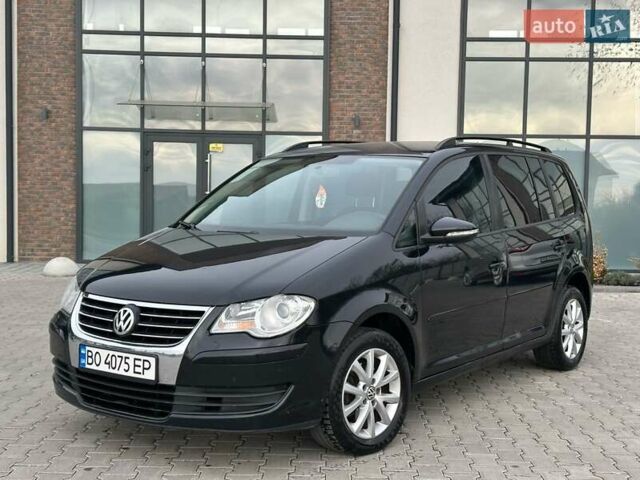 Чорний Фольксваген Туран, об'ємом двигуна 1.97 л та пробігом 336 тис. км за 8200 $, фото 2 на Automoto.ua