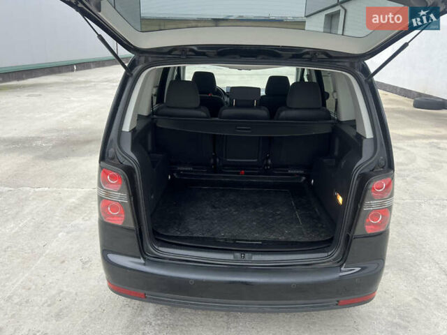 Черный Фольксваген Туран, объемом двигателя 1.4 л и пробегом 213 тыс. км за 8100 $, фото 33 на Automoto.ua