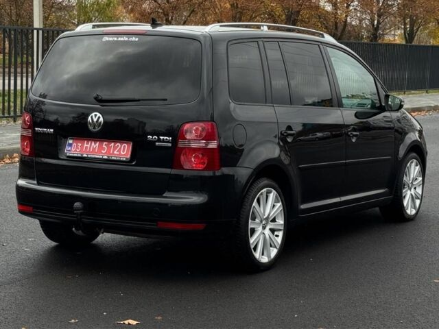 Черный Фольксваген Туран, объемом двигателя 2 л и пробегом 260 тыс. км за 9950 $, фото 3 на Automoto.ua