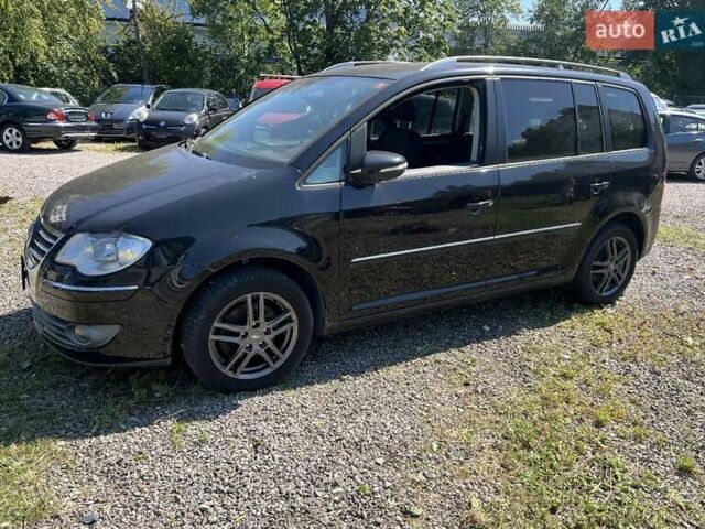 Черный Фольксваген Туран, объемом двигателя 1.4 л и пробегом 238 тыс. км за 7888 $, фото 261 на Automoto.ua