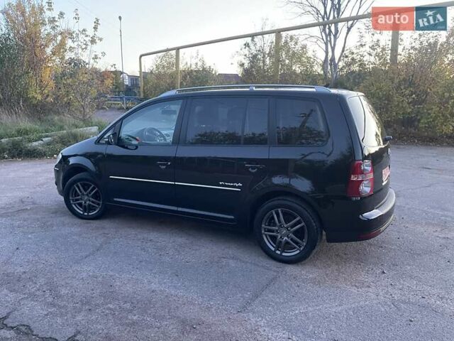 Черный Фольксваген Туран, объемом двигателя 1.4 л и пробегом 238 тыс. км за 7888 $, фото 115 на Automoto.ua