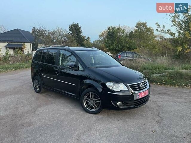Черный Фольксваген Туран, объемом двигателя 1.4 л и пробегом 238 тыс. км за 7888 $, фото 96 на Automoto.ua