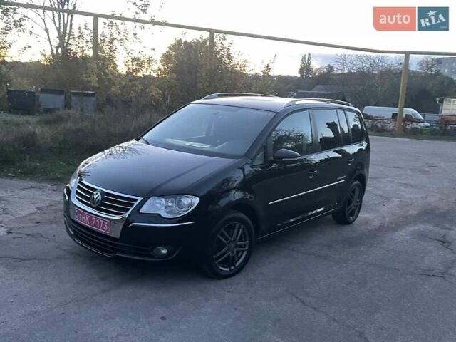 Черный Фольксваген Туран, объемом двигателя 1.4 л и пробегом 238 тыс. км за 7888 $, фото 9 на Automoto.ua